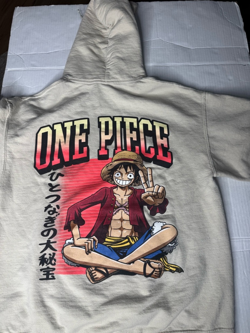 Onepiece Cream Hoodie with Black Logo Print
